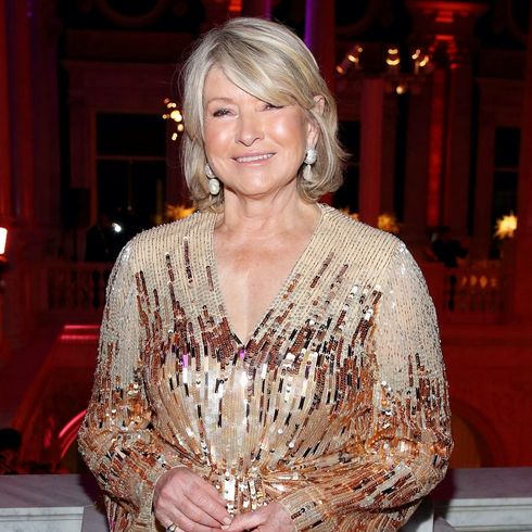 Martha Stewart glimmers in a shiny evening at a fancy event.