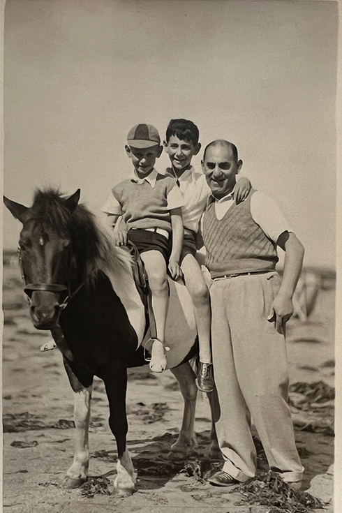 Black-and-white photo of the writer's dad and his brother and father.