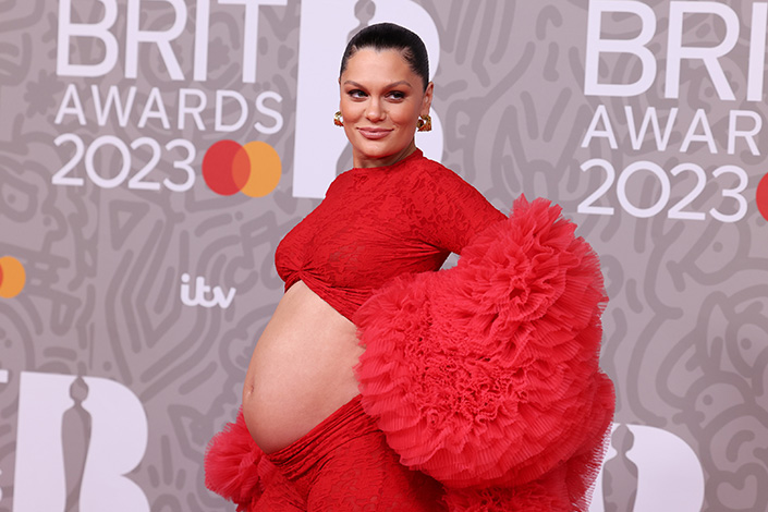 Jessie J wearing red at the Brit Awards 2023