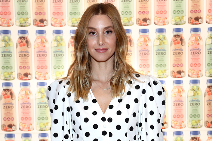 Whitney Port wearing a white with black polka dots outfit
