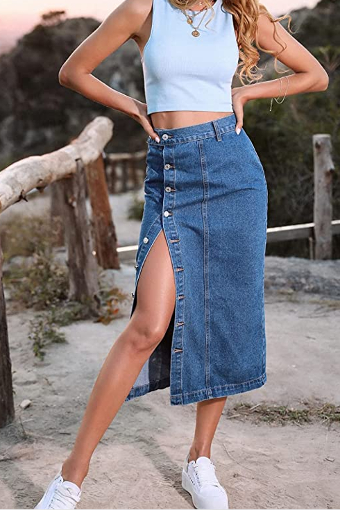 A long denim skirt with buttons and high slit