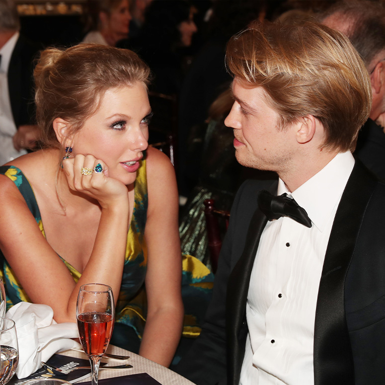 Taylor Swift and Joe Alwyn looking at each other