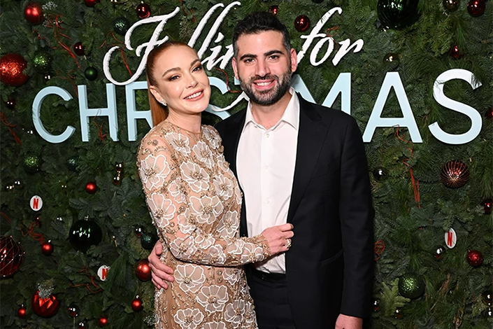 Lindsay Lohan and Bader Shammas attend Netflix?s Falling For Christmas Celebratory Holiday Fan Screening