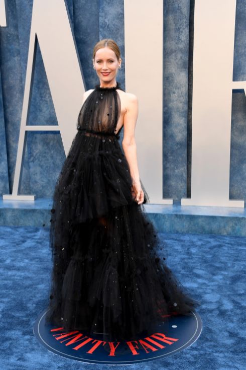 Leslie Mann in a flowy black sheer dress at a red carpet event