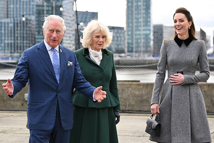 King Charles, Queen Consort Camilla and Kate Middleton laughing outside