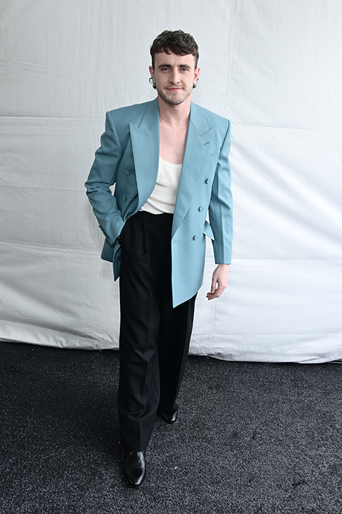 Paul Mescal in a light blue suit jacket and bell-bottomed pants